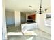 Open concept kitchen with wood cabinets, stone counters and breakfast bar at 2749 Invermark St, Henderson, NV 89044