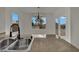 Kitchen bar area featuring stainless sink, faucet, and view of backyard at 2749 Invermark St, Henderson, NV 89044