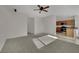 Open-concept living area with view into the kitchen, featuring modern appliances at 2749 Invermark St, Henderson, NV 89044