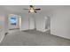 Spacious main bedroom with carpet, ceiling fan, and en suite bathroom at 2749 Invermark St, Henderson, NV 89044