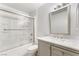 Bright bathroom with shower-tub combo and modern vanity at 3066 Tarpon Dr # 204, Las Vegas, NV 89120