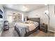 Bedroom with comfortable bed, dresser and a large window at 3066 Tarpon Dr # 204, Las Vegas, NV 89120