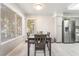 Cozy dining area complemented by a big window and view to the outside at 3066 Tarpon Dr # 204, Las Vegas, NV 89120