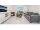 Bright living room featuring a cozy fireplace and sliding doors at 3066 Tarpon Dr # 204, Las Vegas, NV 89120