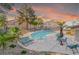 Inviting community pool area with plenty of seating and lush landscaping at 3066 Tarpon Dr # 204, Las Vegas, NV 89120