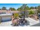 Charming single-story home with mature trees, a two car garage and well-maintained landscaping at 3128 Faiss Dr, Las Vegas, NV 89134