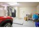 Well-organized garage space with storage and utilities, plus a glimpse of a red car at 3128 Faiss Dr, Las Vegas, NV 89134