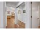 Hallway features hardwood floors, closet with mirror doors, and opens to the dining room at 3128 Faiss Dr, Las Vegas, NV 89134