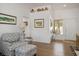Inviting living room with hardwood floors, a comfortable sofa, and plenty of natural light at 3128 Faiss Dr, Las Vegas, NV 89134