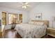 This spacious main bedroom offers a bright interior, wood-look floors, and a cozy bay window at 3128 Faiss Dr, Las Vegas, NV 89134