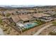 Attractive aerial view of a modern home boasting a private pool, outdoor seating, and beautiful community surroundings at 3131 Reverence Heights Ln, Las Vegas, NV 89138