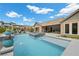 Wonderful outdoor space boasts a luxurious pool, spa, barbecue, and pergola with a dining area at 3131 Reverence Heights Ln, Las Vegas, NV 89138