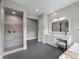 Modern bathroom features dual sinks, soaking tub, walk-in shower, and neutral wall colors at 3131 Reverence Heights Ln, Las Vegas, NV 89138