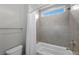 Bright bathroom with shower-tub combination, white tile, and chrome fixtures at 3131 Reverence Heights Ln, Las Vegas, NV 89138