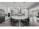 Bright kitchen features a large island with seating, stainless appliances, and ample cabinet space at 3131 Reverence Heights Ln, Las Vegas, NV 89138