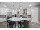 Modern kitchen features stainless steel appliances, large island, and sleek finishes at 3131 Reverence Heights Ln, Las Vegas, NV 89138