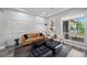 Bright living room with modern decor, wood floors, and ample seating at 3131 Reverence Heights Ln, Las Vegas, NV 89138