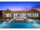 Relaxing pool and spa with built in lounges, stunning backyard, and lush greenery at 3131 Reverence Heights Ln, Las Vegas, NV 89138