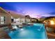 Beautiful pool with spa and outdoor seating, perfect for entertaining or relaxation at 3131 Reverence Heights Ln, Las Vegas, NV 89138