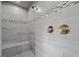 Walk-in shower features gray tile surround, built-in bench, and dual shower heads at 3131 Reverence Heights Ln, Las Vegas, NV 89138