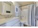 Well-lit bathroom features a shower with a tub and a vanity with a light countertop at 3150 Soft Breezes Dr # 2030, Las Vegas, NV 89128