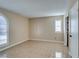 Spacious bedroom featuring tile flooring and two windows with shutters for natural light at 3150 Soft Breezes Dr # 2030, Las Vegas, NV 89128