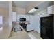 Well-lit kitchen featuring stone countertops, stainless steel appliances, and ample storage at 3150 Soft Breezes Dr # 2030, Las Vegas, NV 89128