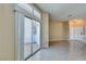 Bright living room featuring tile floors and sliding glass doors to a patio at 3150 Soft Breezes Dr # 2030, Las Vegas, NV 89128