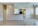 Bright living room features tile floors and easy access to the kitchen and bathroom at 3150 Soft Breezes Dr # 2030, Las Vegas, NV 89128