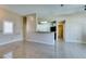 Bright living room features tile floors and easy access to the kitchen and bathroom at 3150 Soft Breezes Dr # 2030, Las Vegas, NV 89128