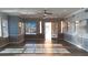 Sunlit lounge with elegant wainscoting, decorative lighting, and a view of the pool at 3150 Soft Breezes Dr # 2030, Las Vegas, NV 89128