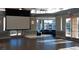 Bright lounge area with large windows, comfortable seating, and a view of the lake at 3150 Soft Breezes Dr # 2030, Las Vegas, NV 89128