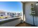 Patio area offers community views, textured stucco, and shade with bright sunny skies at 3150 Soft Breezes Dr # 2030, Las Vegas, NV 89128