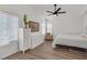 Airy primary bedroom featuring a ceiling fan and offering plenty of closet and drawer space at 349 Clayton St, Henderson, NV 89074