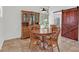 Cozy dining room with custom sliding barn door and views of the outside patio and pool at 349 Clayton St, Henderson, NV 89074