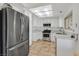 Modern kitchen features stainless steel appliances, white cabinets, and a tile backsplash at 349 Clayton St, Henderson, NV 89074