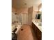 Bathroom featuring tile floors, a glass enclosed shower and a double vanity at 3562 Driving Range St, Las Vegas, NV 89122