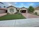 Charming single story home featuring a well-maintained front yard with an attached two car garage at 3562 Driving Range St, Las Vegas, NV 89122