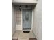 The home's front door is set in a tiled portico, providing some shade at 3562 Driving Range St, Las Vegas, NV 89122
