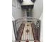 Inviting front porch with decorative iron gate, leading to the main entrance with a secure screen door at 3562 Driving Range St, Las Vegas, NV 89122