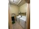 Laundry room featuring tile flooring, a washer and a dryer at 3562 Driving Range St, Las Vegas, NV 89122
