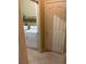 Bright laundry room featuring a washer and dryer, tile floors, and a convenient storage area at 3562 Driving Range St, Las Vegas, NV 89122