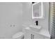 Bathroom featuring square sink, modern vanity, and a lighted mirror at 3727 Hazelwood St # 12, Las Vegas, NV 89119