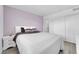Spacious bedroom featuring plush bedding, and plenty of closet space at 3727 Hazelwood St # 12, Las Vegas, NV 89119