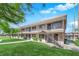 Charming apartment building featuring well-maintained lawns and a stairway leading to the second floor entrance at 3727 Hazelwood St # 12, Las Vegas, NV 89119