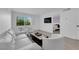 Serene living room with neutral tones, modern amenities, and bright natural light at 3727 Hazelwood St # 12, Las Vegas, NV 89119