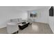 Cozy living room featuring modern furniture, sleek flooring, and ample natural light at 3727 Hazelwood St # 12, Las Vegas, NV 89119