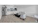 Modern living space with stainless steel appliances, sleek furniture, and ample natural light at 3727 Hazelwood St # 12, Las Vegas, NV 89119
