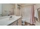 Neat bathroom with a shower and tub, providing a functional and clean space at 3816 Sunking St, Las Vegas, NV 89130