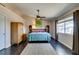 Primary bedroom features a ceiling fan, lots of light, and space for furnishings at 3816 Sunking St, Las Vegas, NV 89130